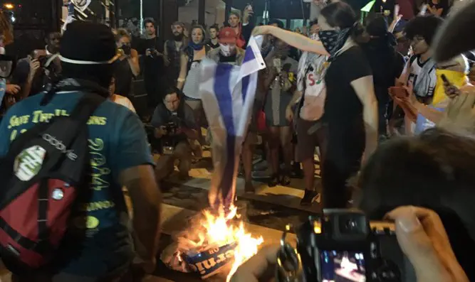 Protester burn Israeli flag outside DNC