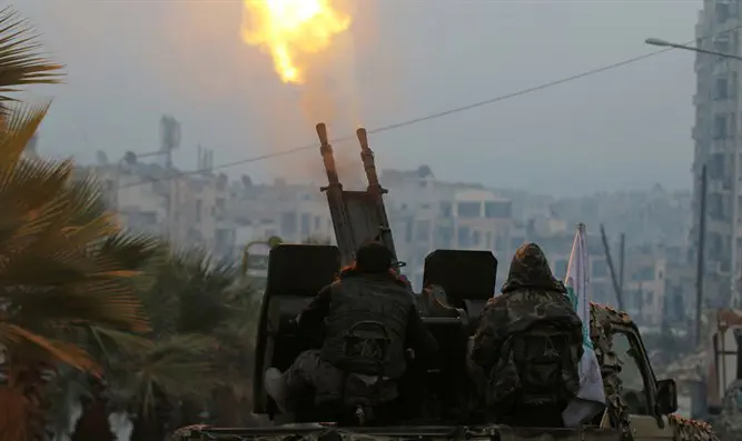 Free Syrian Army fighters fire anti-aircraft weapon